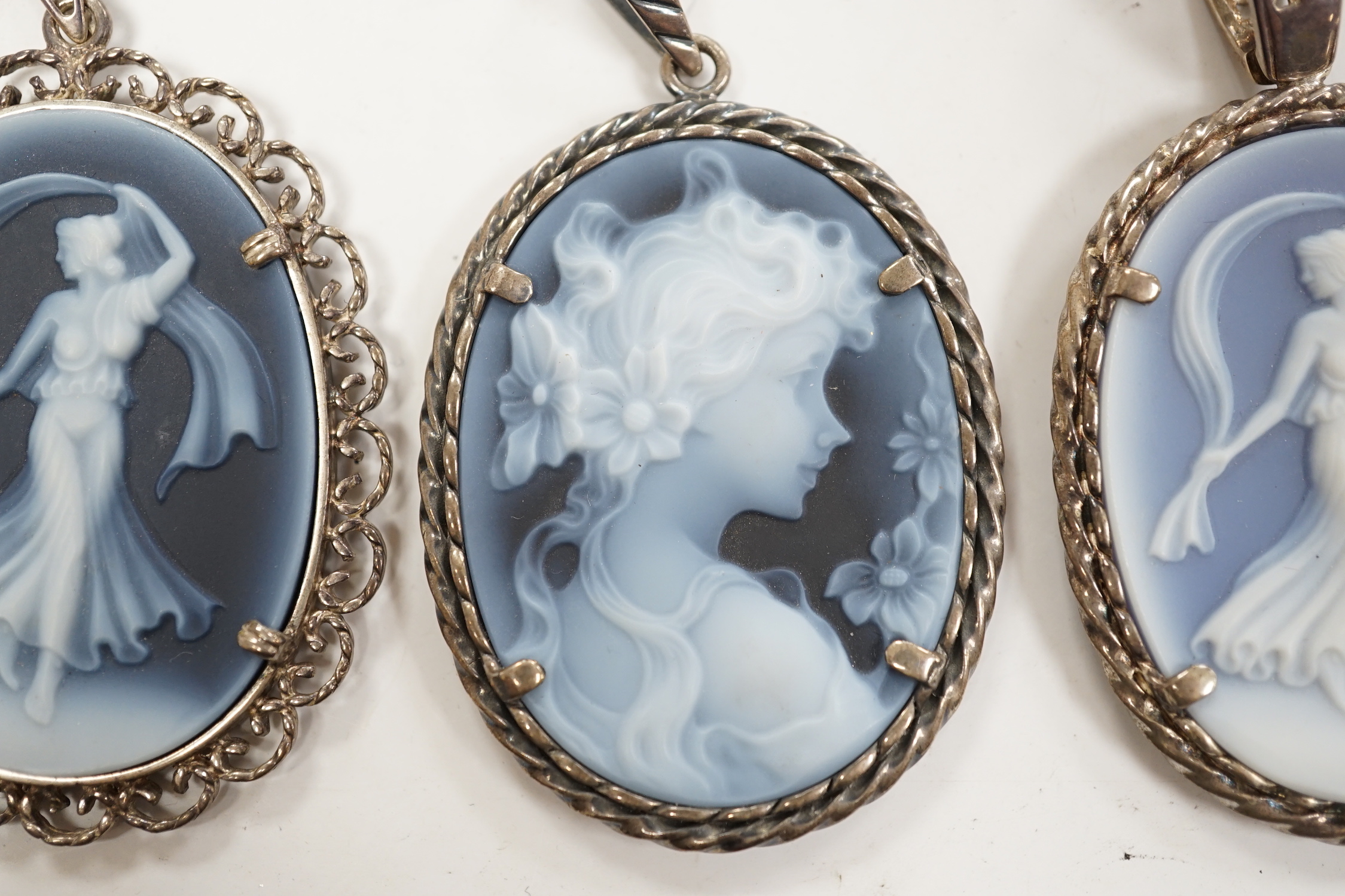 Three modern 925 or silver mounted Wedgwood style oval plaque pendants, 42mm.